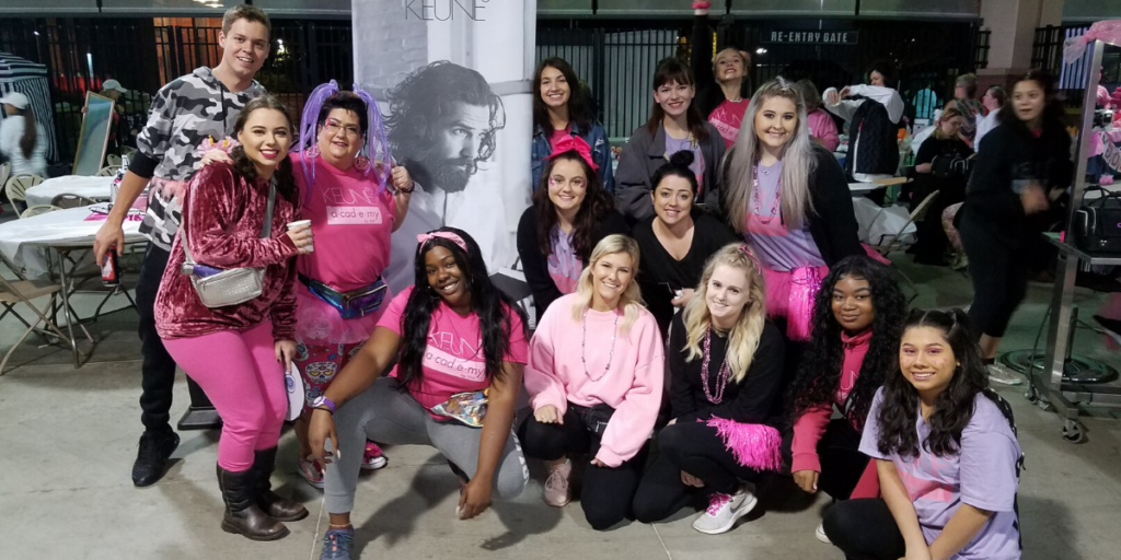 Keune Academy by 124 students dressed in pink posing for a picture